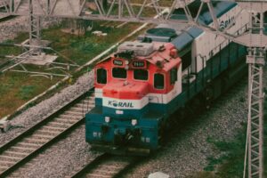 Drone shot of a Korail locomotive on railway tracks in Seoul. Perfect transportation and travel theme.
